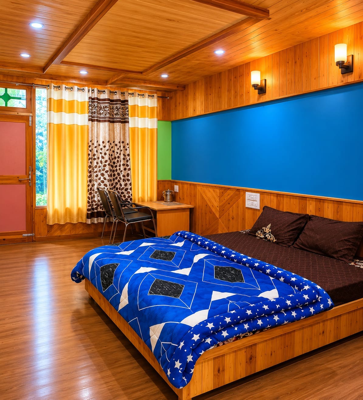 Bedroom with blue bedding at Sunset Homestay